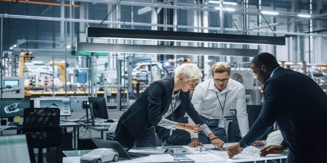 three people discussing plan