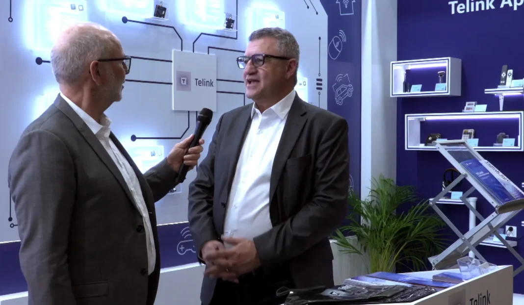 man talking with interviewer