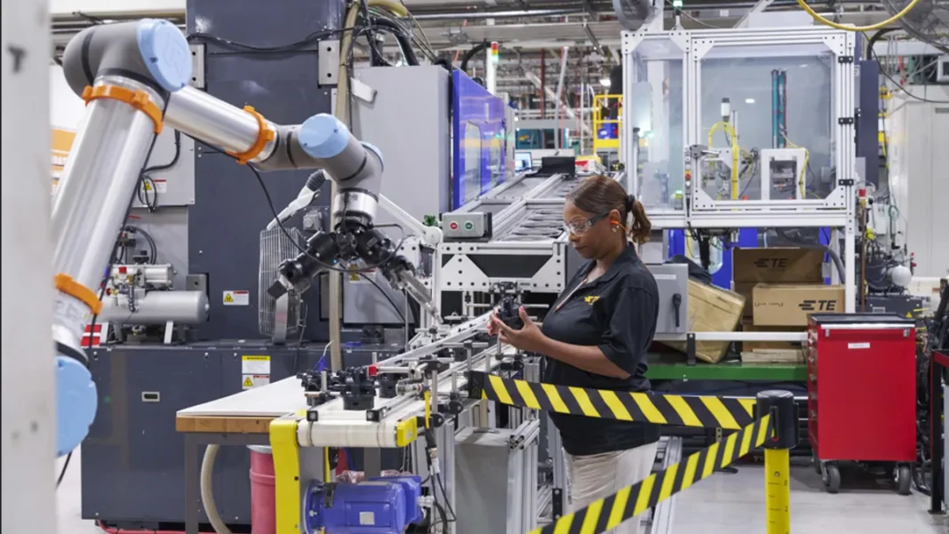 woman working with advanced machinery