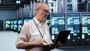 image about Executive doing regular server checking on data center